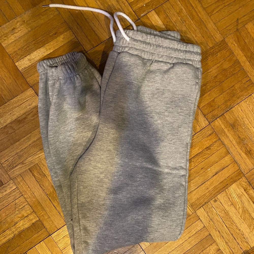 grey sweatpants/ joggers